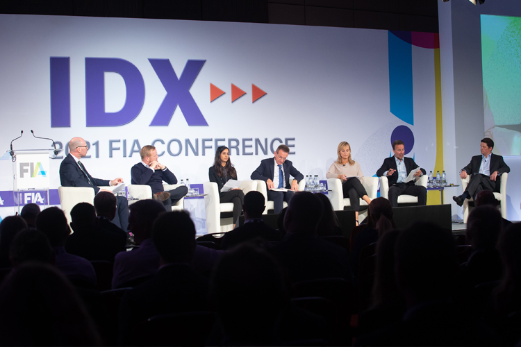 Industry experts speak during IDX
