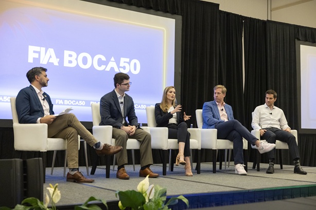 Panellists at FIA Boca 2025 sit on a stage and discuss prediction markets