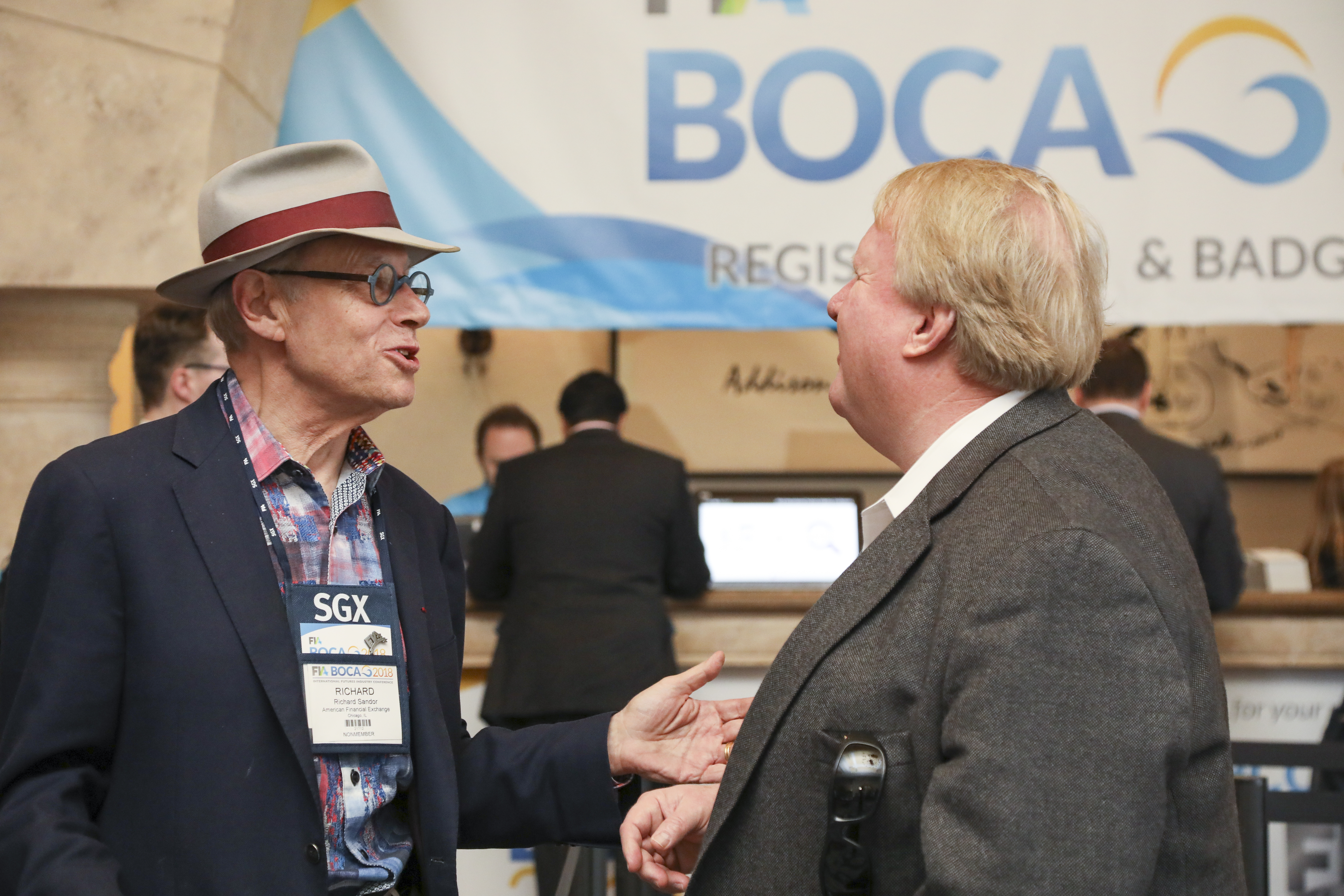 Richard Sandor of the American Financial Exchange chats with Tom Hammond, former head of ICE Clear U.S. 